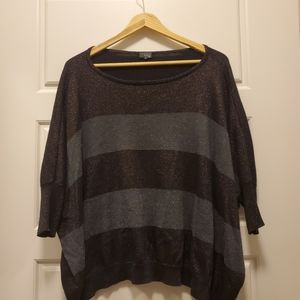 Oversize-style sparkle over the shoulder sweater